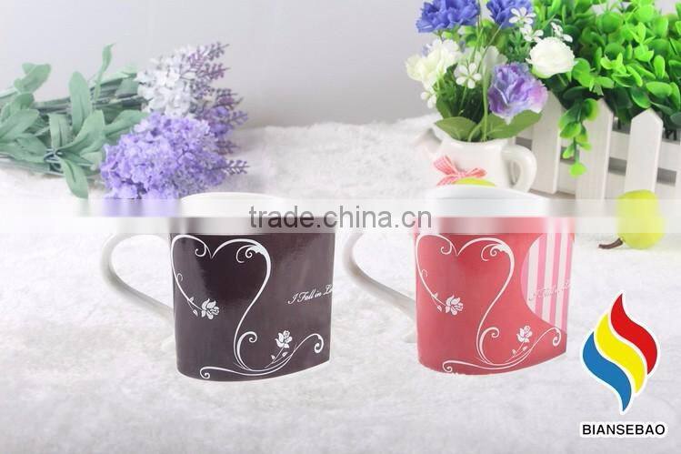 heart shape ceramic mug with revolving logo