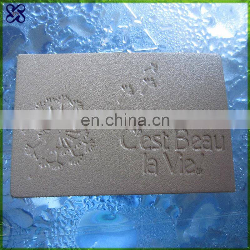 Embossed,embossed logo Technics and Leather Material jeans leather label