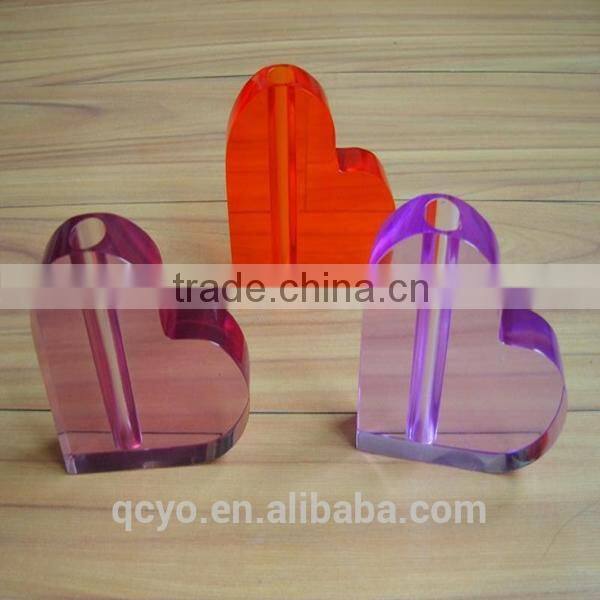 heart shaped office pen holder stand in table