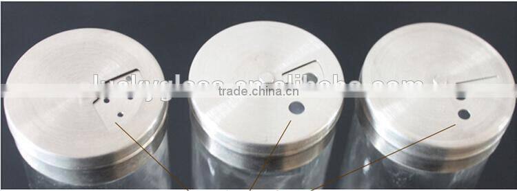 glass condiment salt holder with stainless steel caps