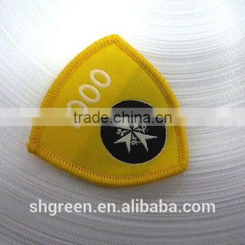 Round high density woven label with serging border for kids garment