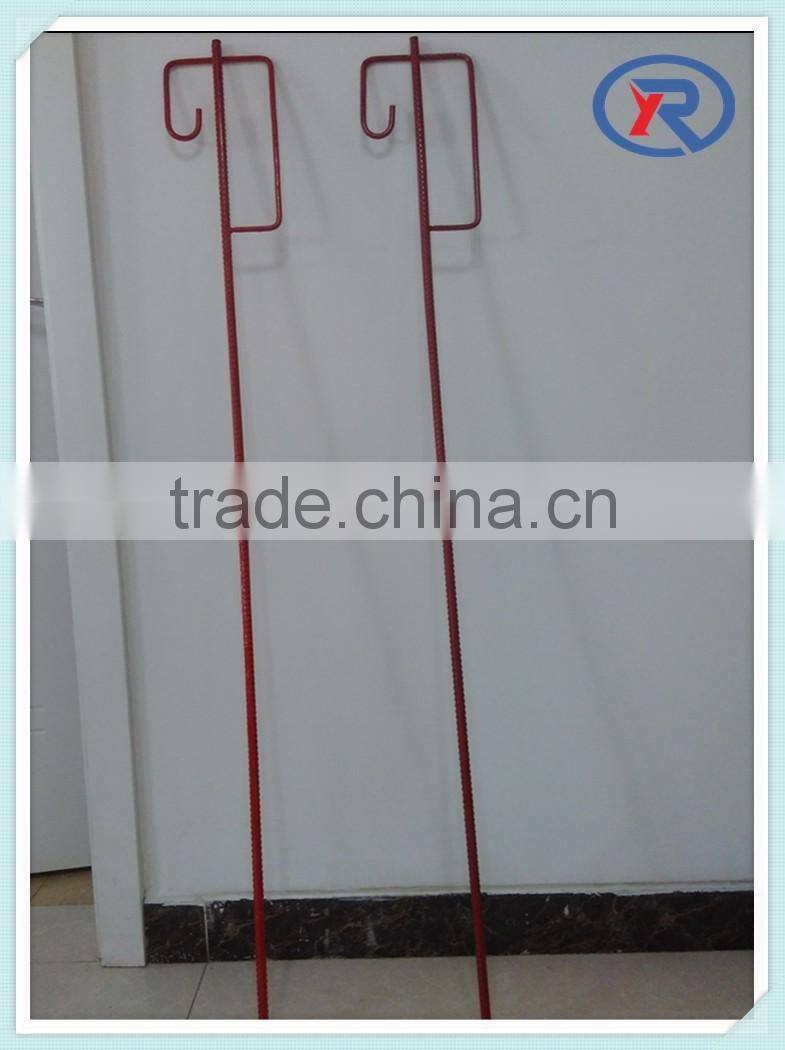 red painted steel picket fence post