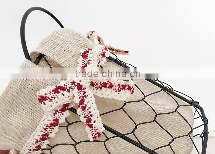 Small rustic tall wire basket with handle for storage