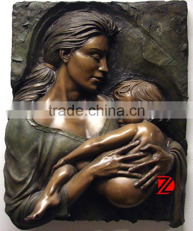bronze mother and angel wall sculpture
