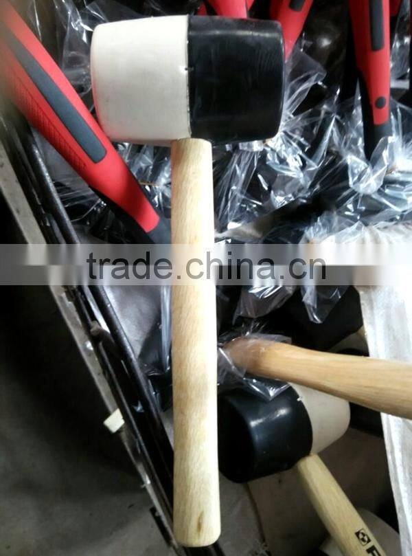 white colored rubber mallet hammer with wooden handle