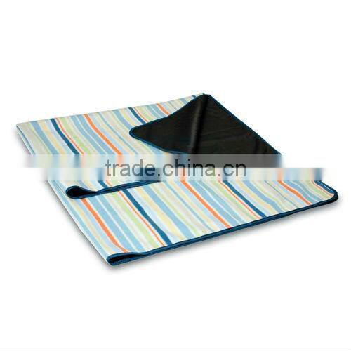 stripe printed blue mat used on beach 2013