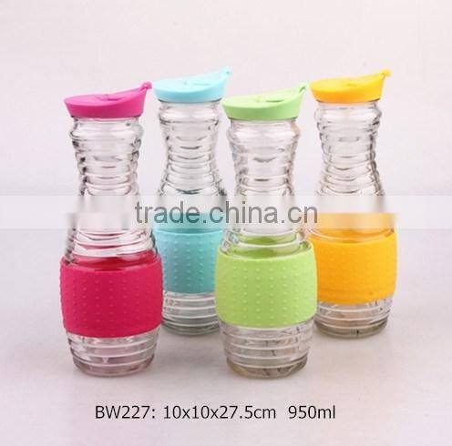 clear round glass juice jar with plastic lid and silicon wrap