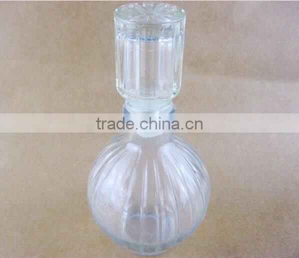 round glass wine bottle/ glassware