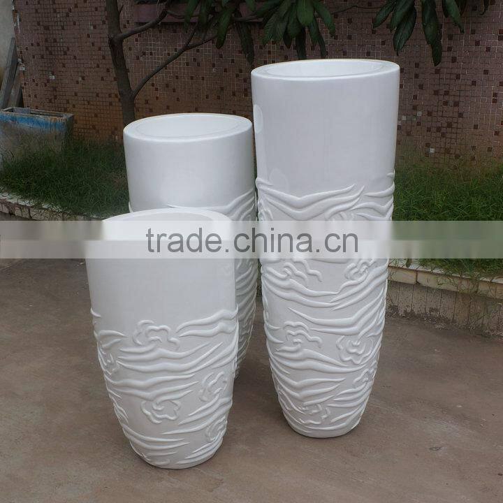 Modern white fiberglass planter