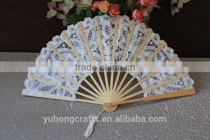 Bridal held white lace fan