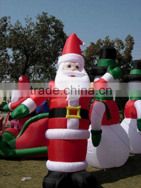 Inflatable Santa on boat with Penguin