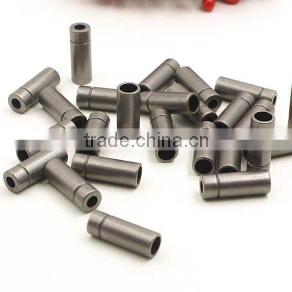 cylindrical metal alloy cord stopper