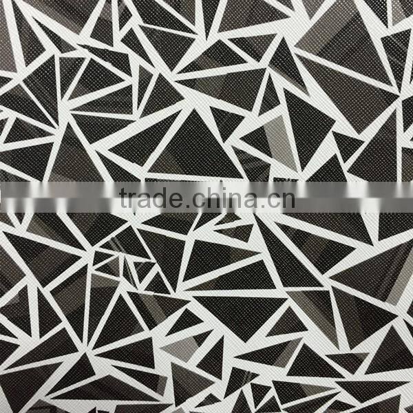 With film emboss surface ,PVC simili leather with geometric figure design , use for sofa ,chair cover ,handbags,upholstery