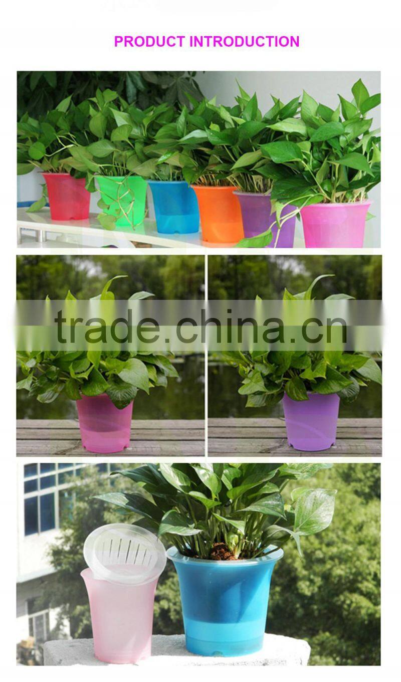Decorative plastic self watering flower pot