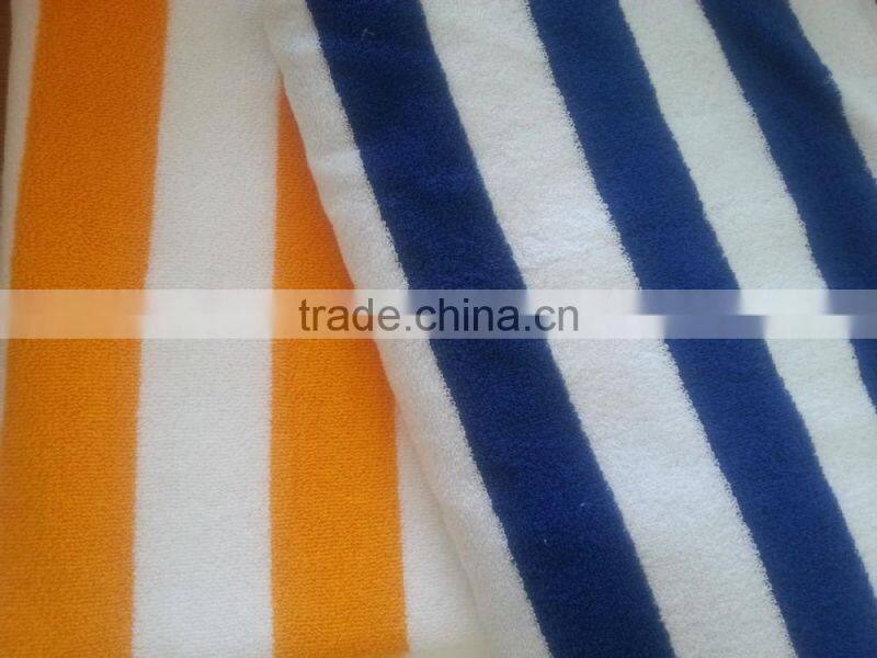 Yellow and white hotel pool towel, beach towel