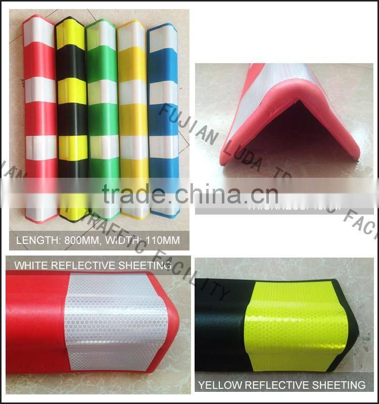 Colored wall corner protector for parking lot