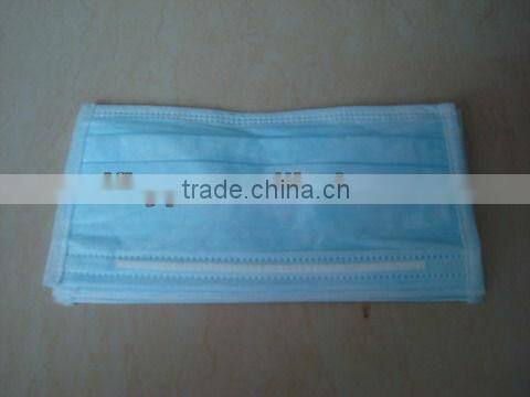 white disposable dust mask
