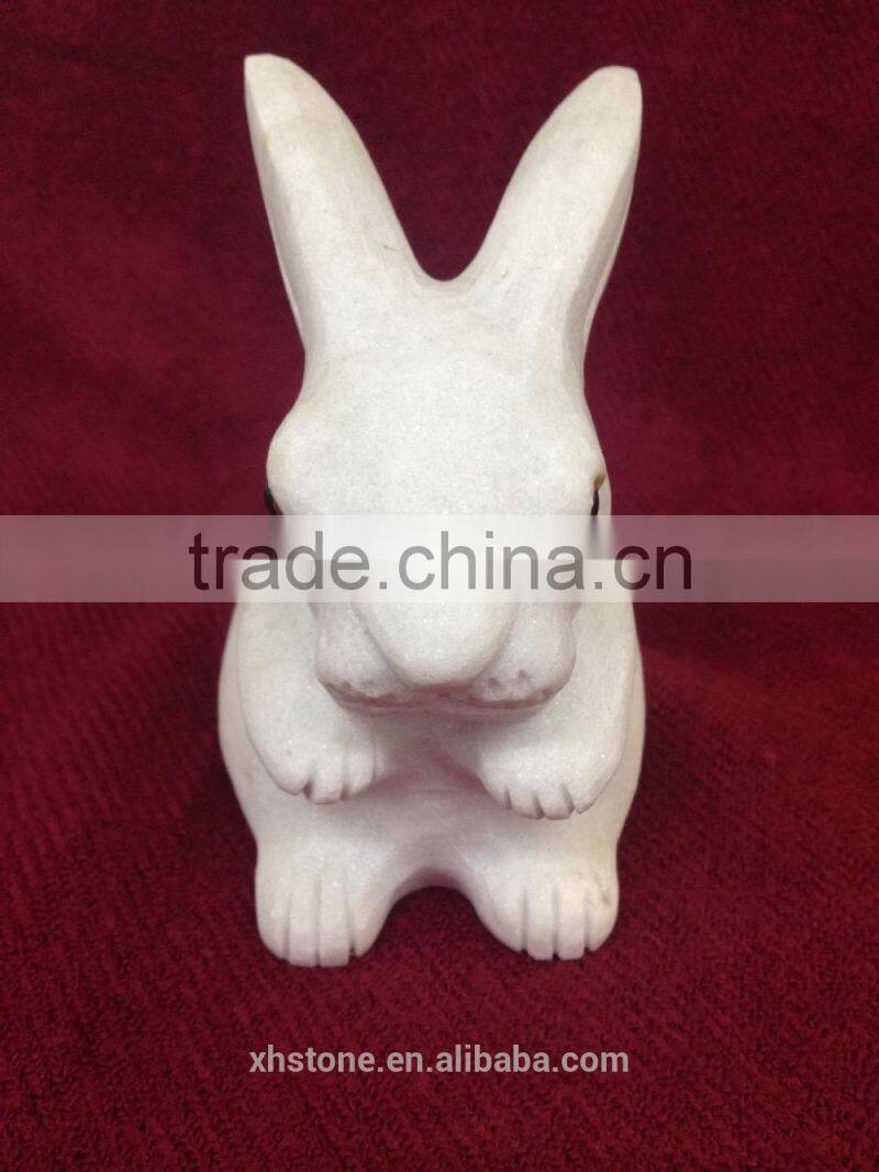 The small white rabbit stone statue,stone sculpture , stone craft