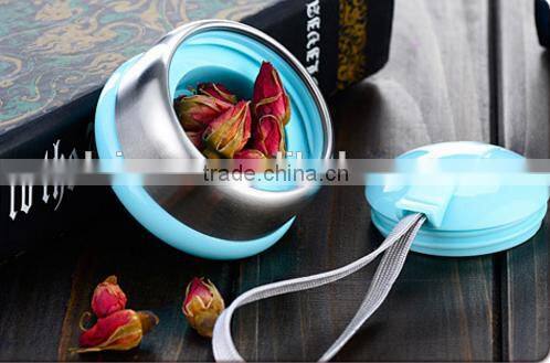 best sell lovely round shape glass tea infuser bottle with sleeve and tea holder