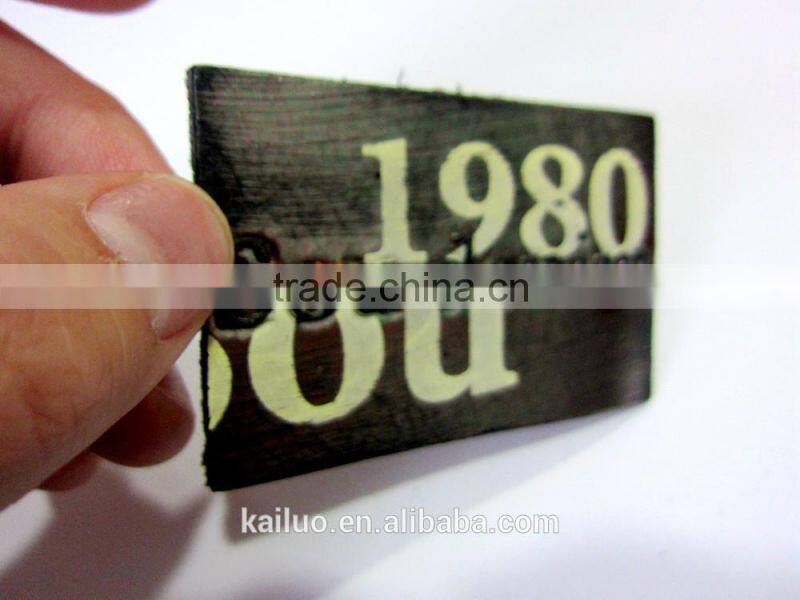Embossed logo leather label for jeans