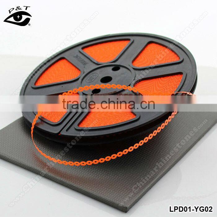 Fluorescent neon orange pet sequin reel for garment