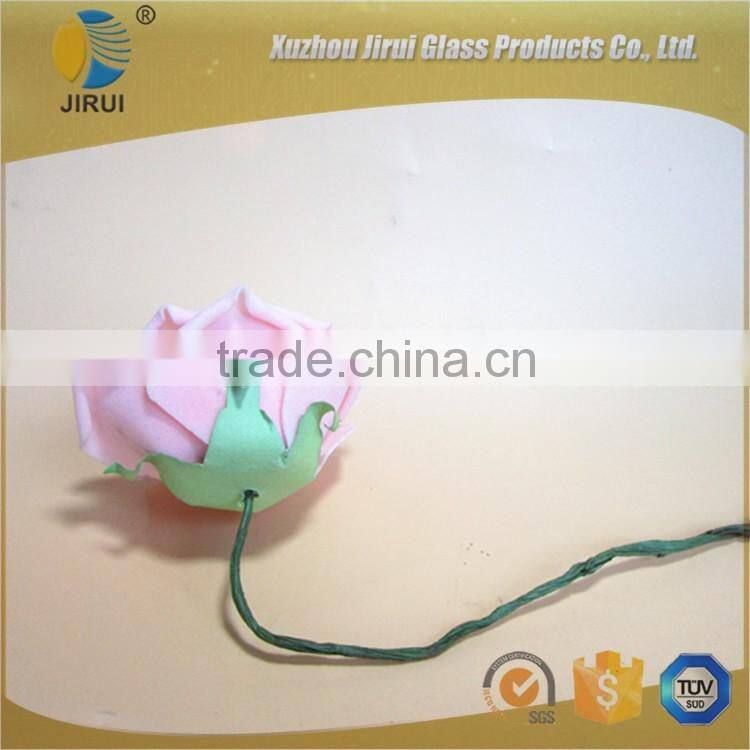 Rose sola flower with reed