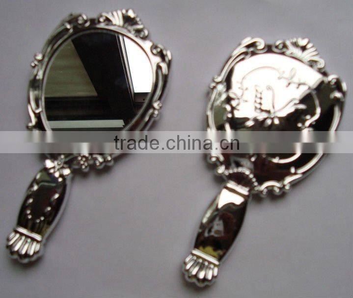 Classic plastic makeup hand mirror