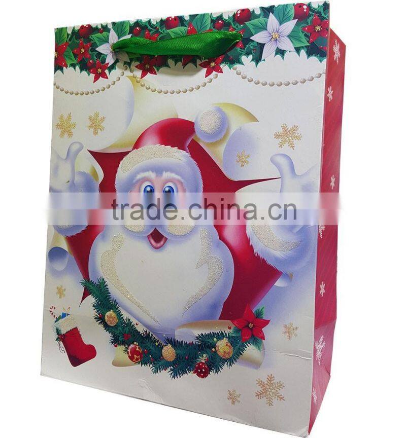 glittered paper shopping bag with Santa printing
