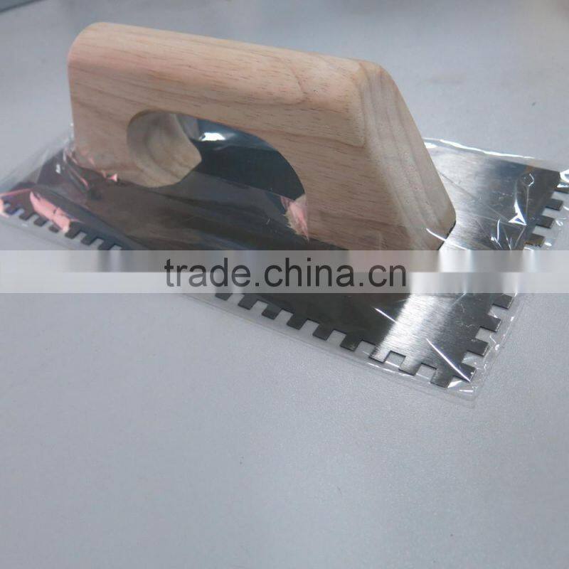 Notched Manganese steel plastering trowel with wood handle