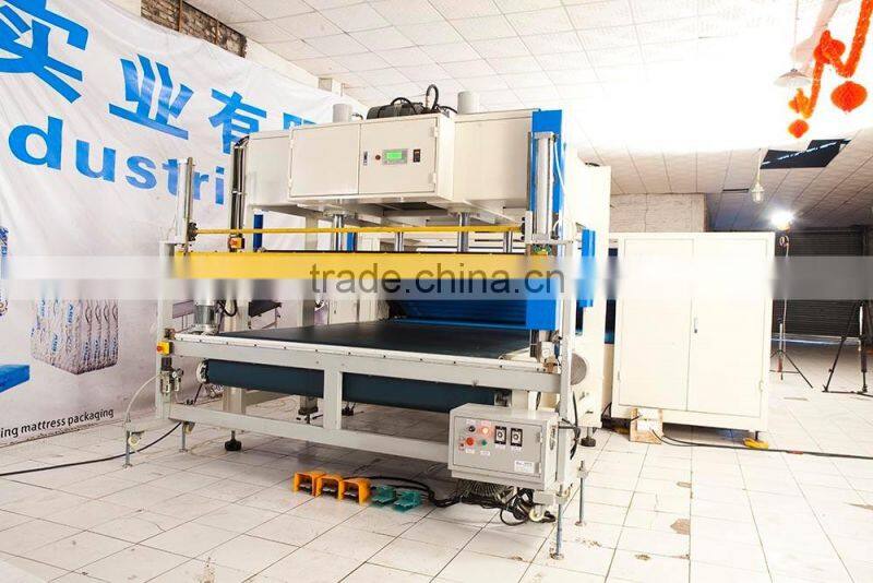 2017 China NaiGu automatic mattress film sealing compression roll packing machine