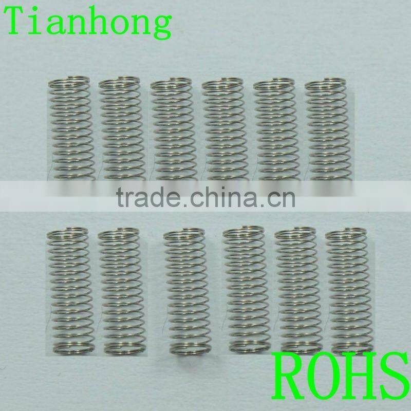 Conical compression spring with different diameters