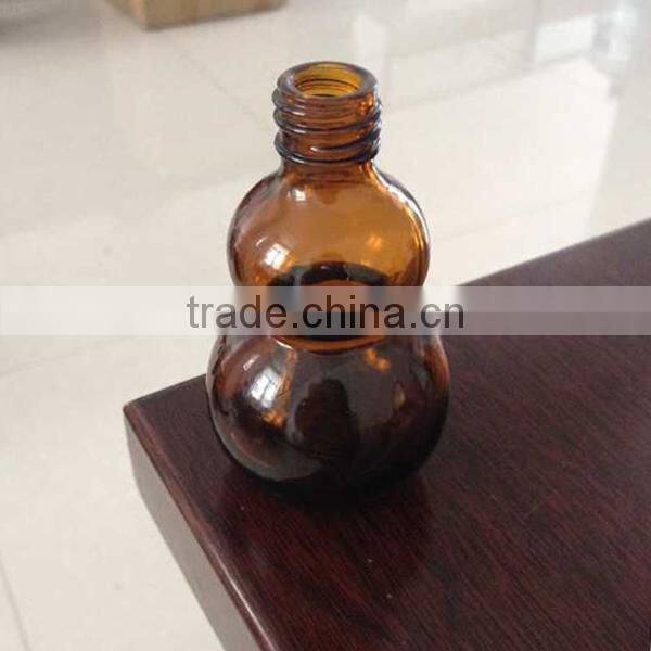 Unique Shaped Amber Boston Round Glass Bottles