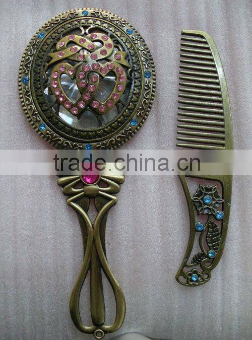Antique bronze hand makeup mirror with comb in one set