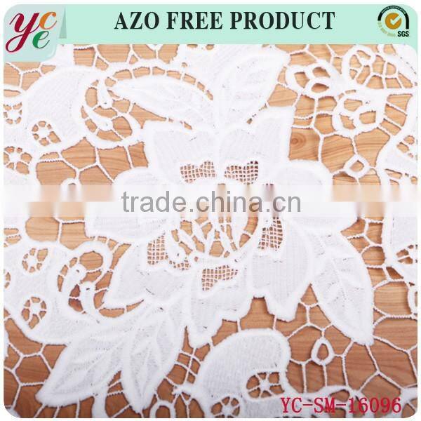 Pure white bloom pattern hollow woven fabrics embroidery fabric for wedding dress