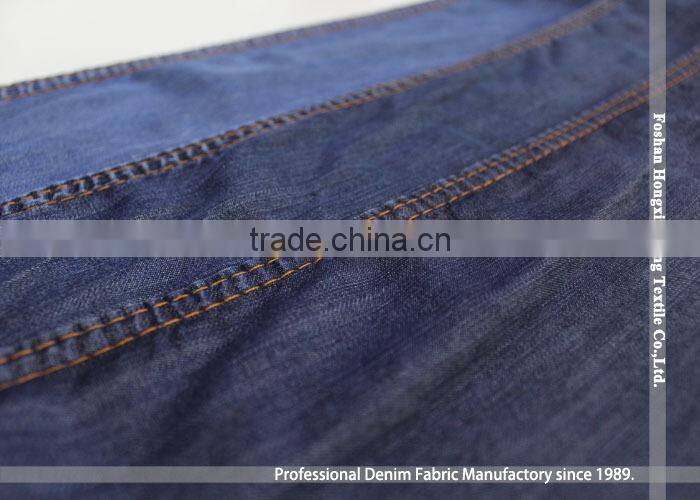 Wholesale large quantity supplier Plain pure 100% Tencel cotton denim fabric for jean garment