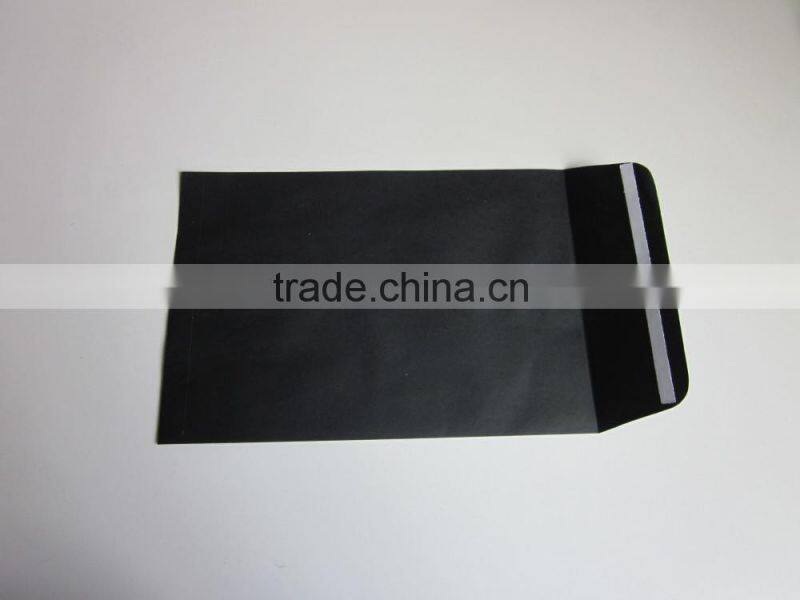 black envelope with insert