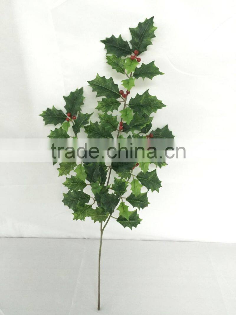 Artificial holly plant branch with red berries for xmas decoration