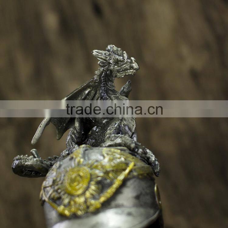 Pewter dragon with helmet figurine