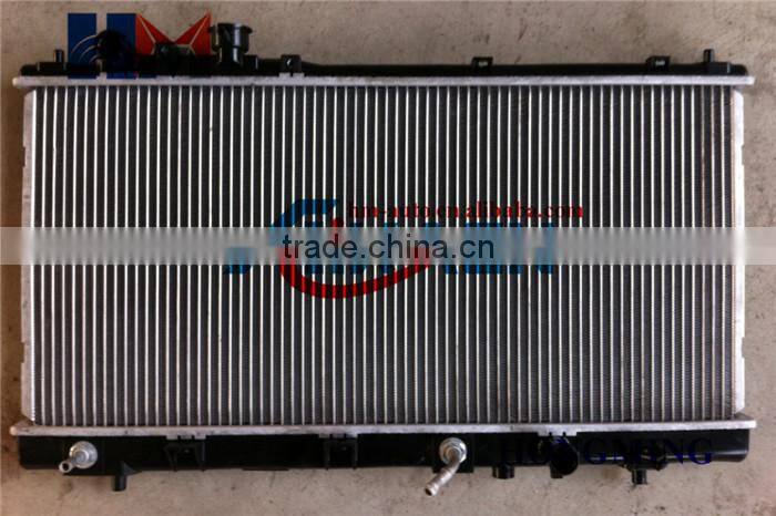 Alumnium radiator 2003 OEM FS7P15200C ALumnium or Alumnium plastic
