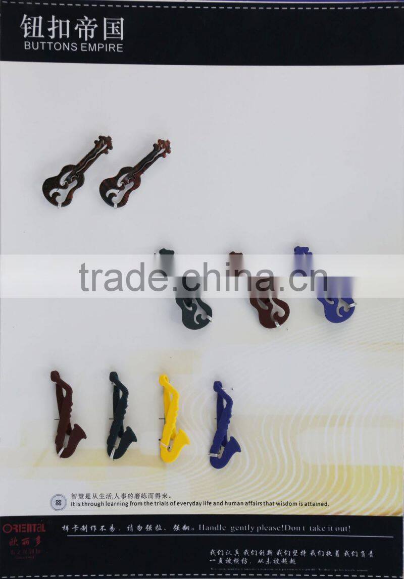 matt black key-shaped metal brooch for men