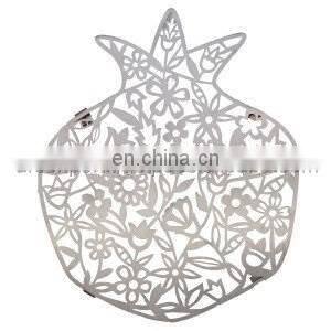 silver flower design trivet