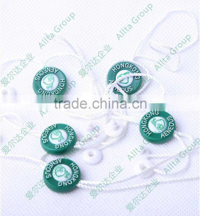 Custom plastic embossing seal tag for garment