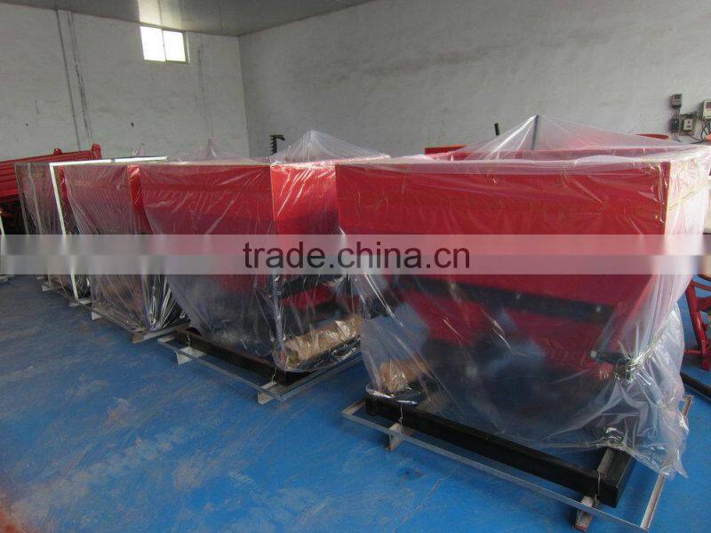 Agricultural tractor mounted broadcast sower