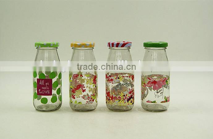 Round glass milk beverage bottle with decorative printing 200ml