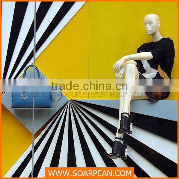 Unique visual merchandising fiberglass bag retail store display rack