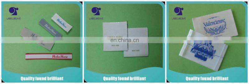 Heat transfer woven label for children's garment and toy