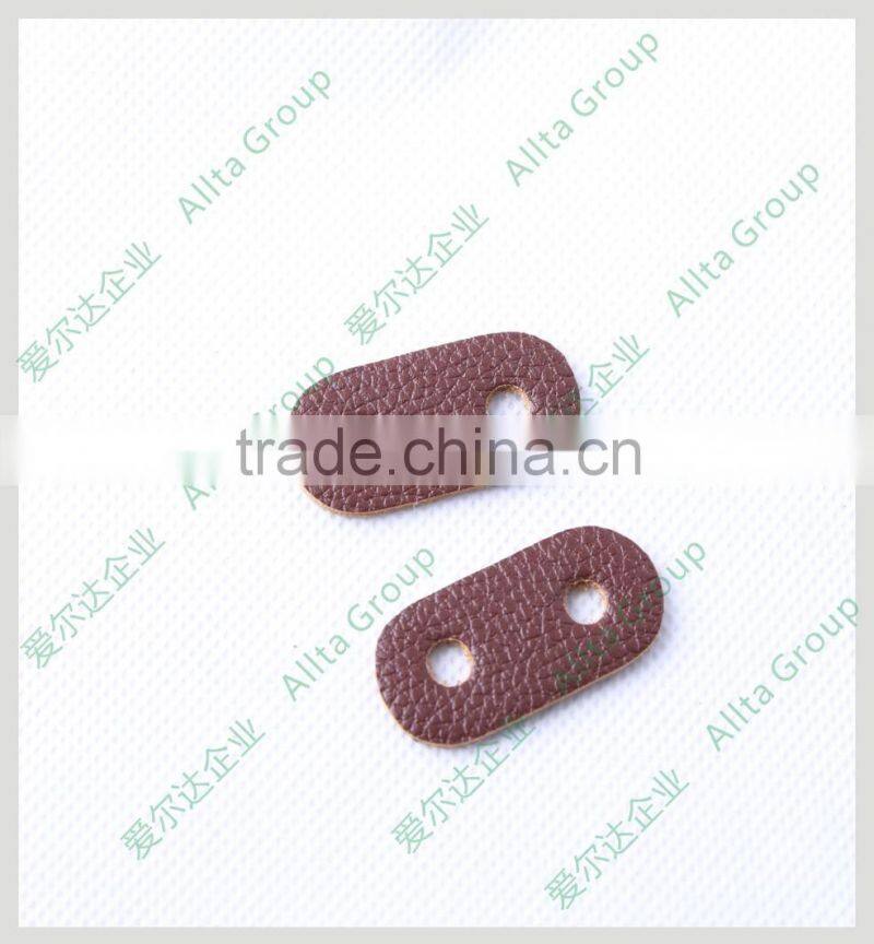 Wholesale custom your company logo embossed leather patch for garment hats in china
