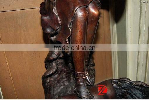 Bronze lady statue with shell water fountain