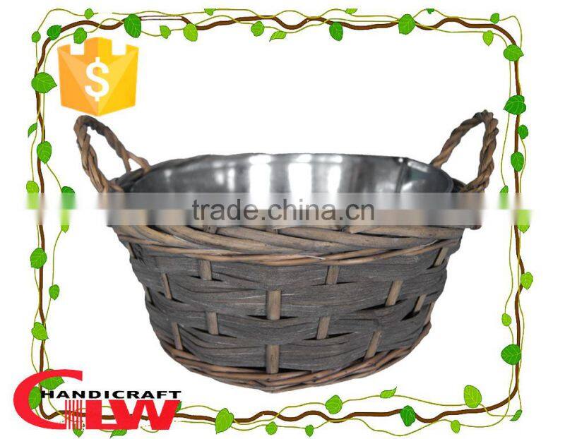 wicker and woodchip garden furniture, plant pot, garden flower basket with round iron bowl inside