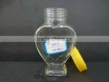 clear storage jar for honey, empty glass bottle